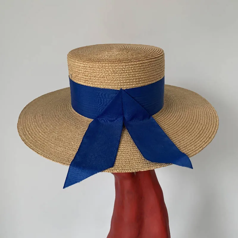 Vintage oversized boater straw hat with blue starp made in Venice, Italy